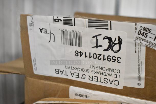 Cardboard box with a shipping label for "Caster 5" EA Tab W/Brace 600CA5TER." Barcode and handwritten markings visible.