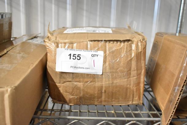 Cardboard box on metal shelf, visibly worn with a label marked "155 QTY" from PCI Auctions.