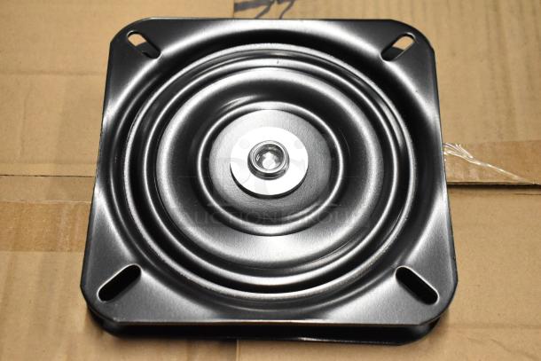 Black metal swivel plate, square with rounded corners, features a central bearing. In excellent, unused condition.