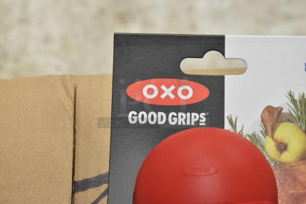 Oxo Good Grips packaging with a red kitchen tool. Brand logo is clear. Box suggests a cooking or food preparation item.