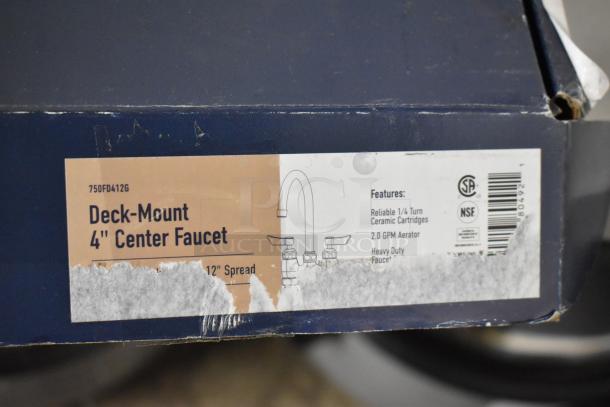 Deck-Mount 4" Center Faucet box, featuring a 2.0 GPM aerator and reliable 1/4 turn ceramic cartridges. Box slightly worn.