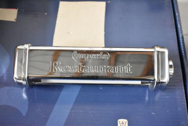 Imperia Restaurant pasta machine attachment, chrome finish, branded text, in excellent condition, ideal for commercial use.