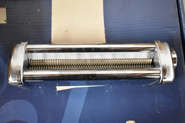 Stainless steel pasta cutter attachment, roller style, pristine condition, fits standard pasta machines.