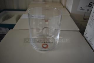 Clear glass tumbler, Stolzle Lausitz brand, "Born in Fire" marking, pristine condition, on boxes.