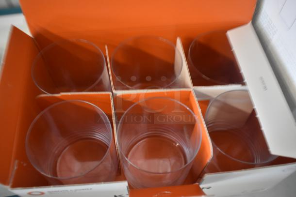 Box of six clear drinking glasses in pristine condition, housed in orange and white packaging.