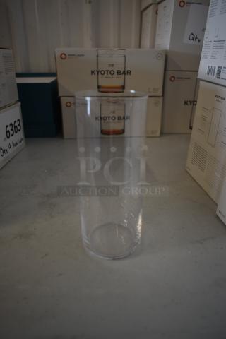Stölzle Lausitz Kyoto Bar glass, clear cylindrical shape, pristine condition, in front of branded packaging boxes.