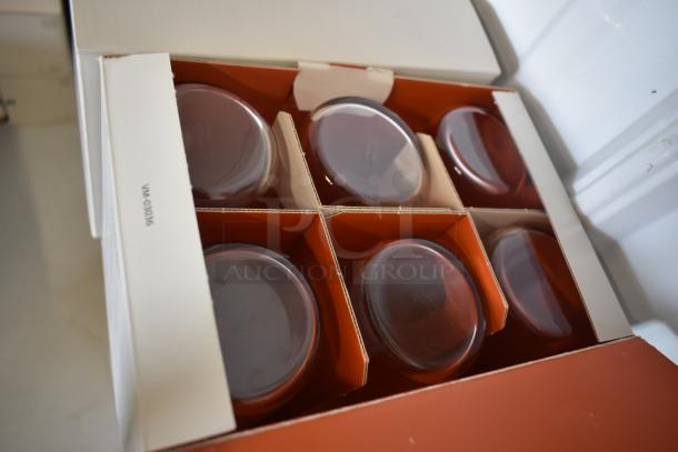 Box of six glass lids, labeled "VM-03096," in original packaging. New condition.