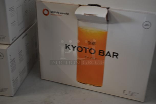 Box of Stölzle Lausitz Kyoto Bar glasses, set of six, new in packaging, designed for juices, featuring elegant design.