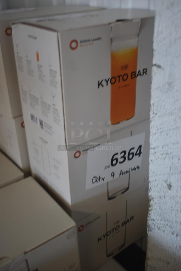 Boxes of Schott Zwiesel Kyoto Bar glasses, new condition, label indicates 6-ounce juice glasses. Quantity: 9 available.