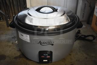 Avantco rice cooker, silver with black accents, model features cook and keep warm functions. Appears in good condition. Auction tag 184.