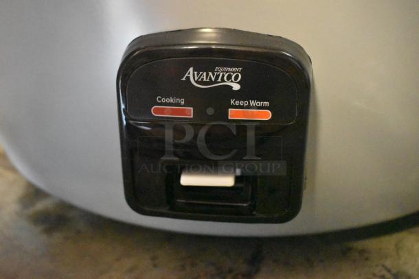 Avantco rice cooker control panel with cooking and keep warm modes, black and silver design.