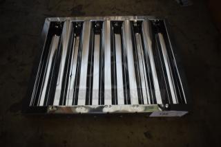 Stainless steel commercial kitchen grease filter, rectangular, polished finish, in excellent condition.