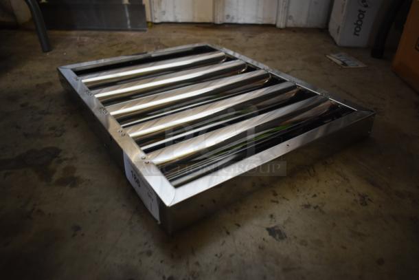 Chrome roller conveyor section in excellent condition, metal frame, five rollers, tag indicating item number 186.