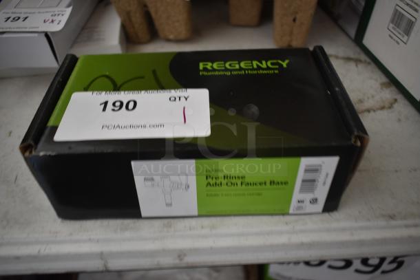 Regency Pre-Rinse Add-On Faucet Base, model 600PSA, new in box with auction tag 190, on shelf.