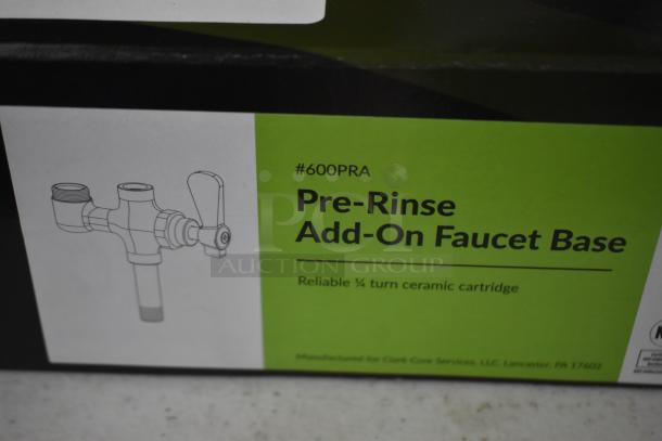 Box of #600PRA Pre-Rinse Add-On Faucet Base with ¼ turn ceramic cartridge, made by Clark Core Services, new condition.