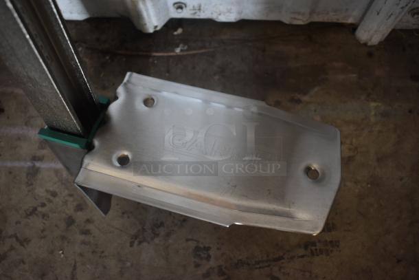 Metal GAARD component with pre-drilled holes, engraved logo, in good condition. Suitable for industrial or mechanical use.