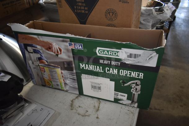 Heavy-duty manual can opener in original packaging, marked "Made in USA", brand "Garden", suitable for professional use.