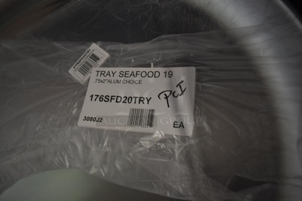 Aluminum seafood tray, model 176SFD20TRY, 0.75"x2", new condition, labeled with product and barcodes, wrapped in plastic.