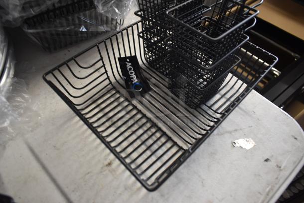 Black wire baskets, various sizes, Acopa brand label, new condition, ideal for organization or storage.