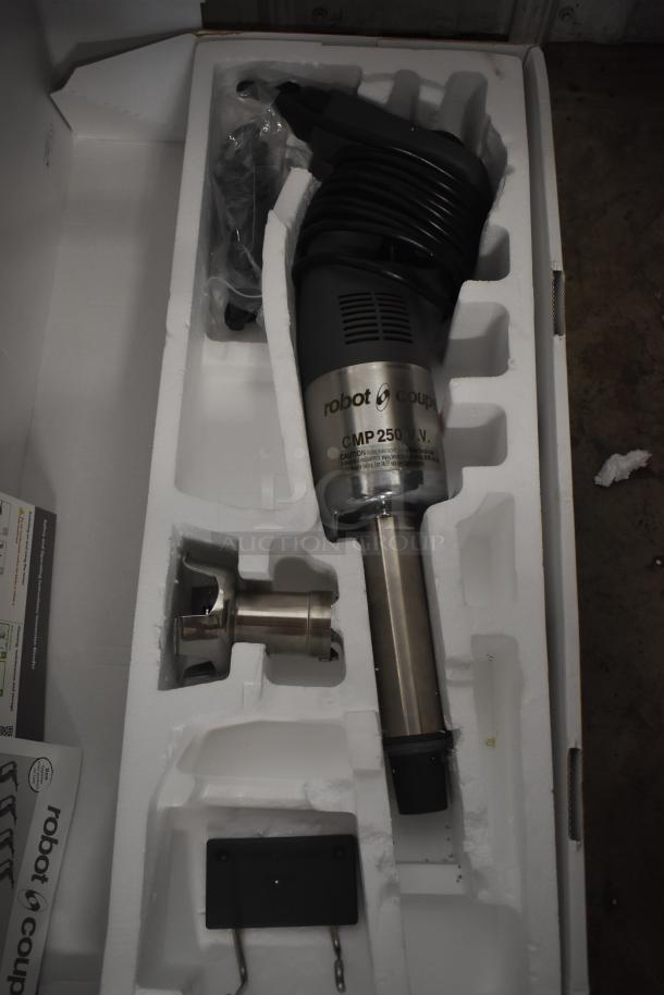 Robot Coupe CMP 250 V.V. Immersion Blender in original packaging, includes blending shaft and accessories, excellent condition.