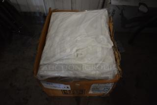 Box of white fabric or material sheets, wrapped in plastic. Box shows signs of wear with visible labels and markings.