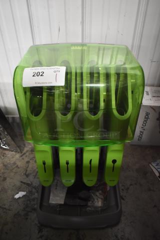 Green cutlery dispenser with fork, knife, and spoon sections. Auction label reads "202". In good condition.
