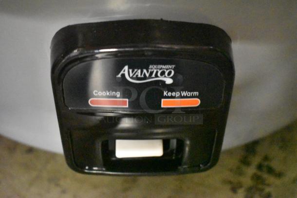 Avantco rice cooker control panel with cooking and keep warm settings. Black and red indicator lights.