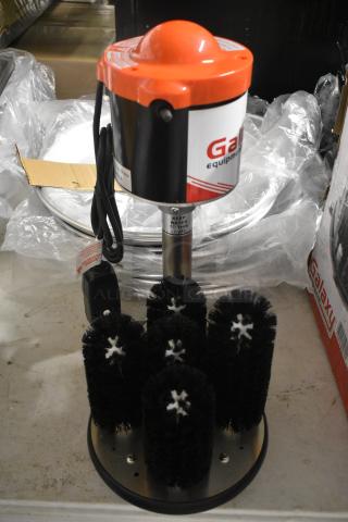 Commercial glass washer with rotating brushes, Galaxy brand, electric-powered, in like-new condition. Tags indicate water level.