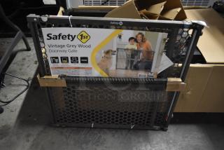 Safety 1st vintage grey wood doorway gate, new in box, pressure mount, suitable for doorways and stairways, durable construction.