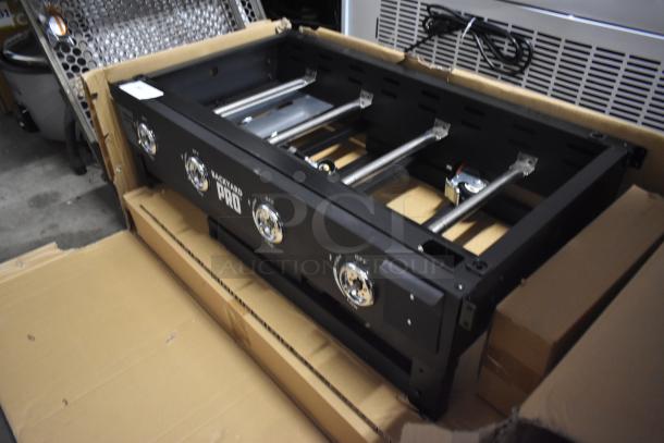 Backyard Pro grill base, new in box, with four control knobs, stainless steel components, and durable black finish.