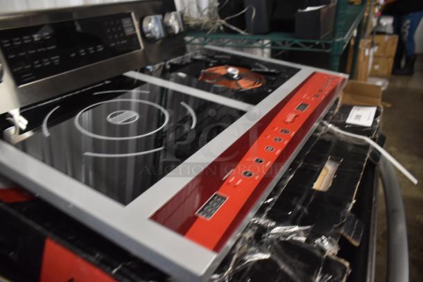 Modern electric cooktop with red control panel, stainless knobs, and dual induction burners. New, in excellent condition.