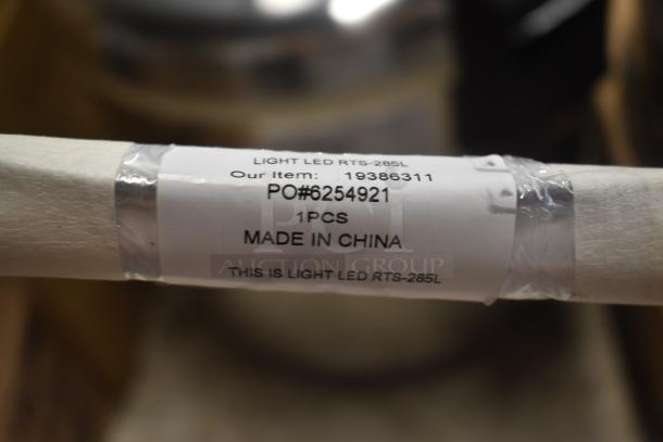 LED light tube RTS-285L, with label showing PO#6254921, made in China, new condition, item number 19386311.