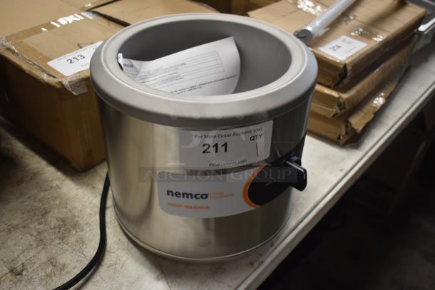 Nemco soup warmer, stainless steel, model label visible, auction tag 211, tabletop condition with user manual inside.
