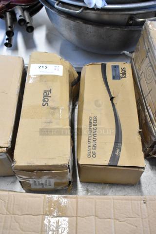 Two Talos boxes of beer equipment, cardboard packaging with visible wear, label indicates quantity "215 QTY X2".