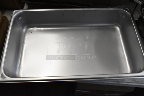 Stainless steel deep roasting pan, smooth finish, gently used with minor surface marks, ideal for commercial kitchen use.