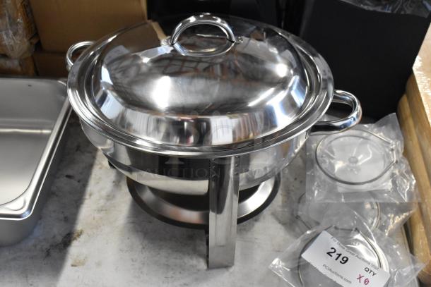 Stainless steel chafing dish with lid, new condition, includes extra parts in sealed bags, tag indicates quantity of six.