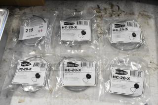 Steril-Sil HC-20-X hinged lids, clear plastic with stainless steel rings for 30-ounce containers, six packs, new condition.