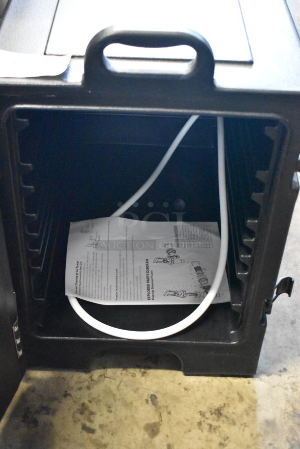 Black storage cabinet with open door, showing interior shelving, white tubing, and instructions labeled "Exploded Parts Diagram."