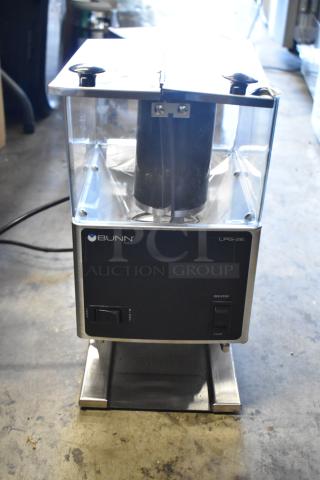 Bunn LPG-2E coffee grinder, black with chrome accents, dual control switches, visible brand logo, used condition.