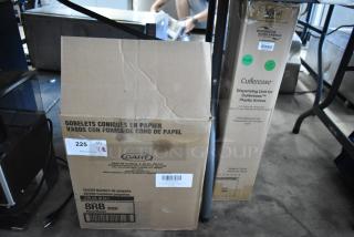 Cardboard boxes for auction, one labeled "Dart" for paper cone cups, quantity 225; another for "Cutlerease" plastic knife dispenser.