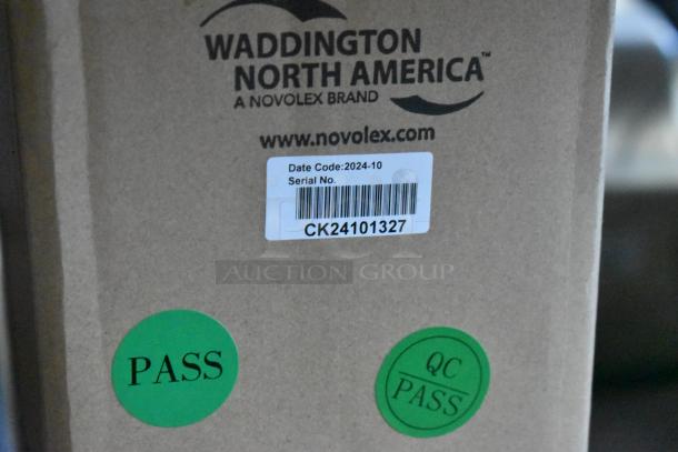 Waddington North America box with barcode, date code 2024-10, serial CK24101327. Green labels indicate QC pass.