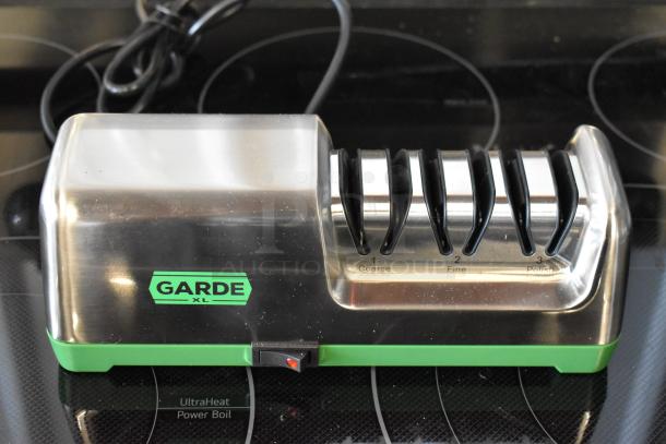 Garde XL knife sharpener with three slots labeled coarse, fine, and polish in good condition.