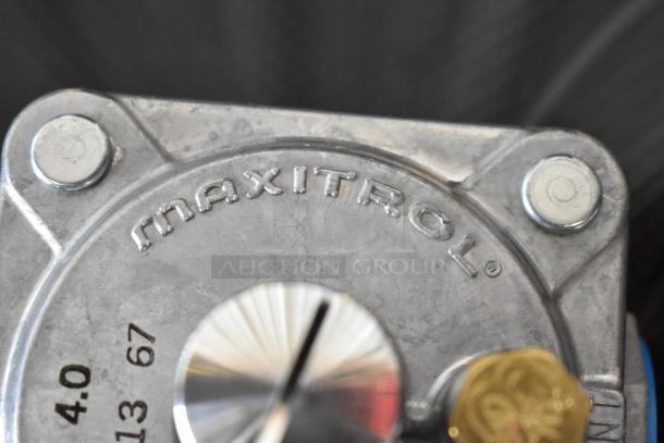 Maxitrol pressure regulator, model 4.0, shown close-up. Markings indicate model and serial number. Good condition.