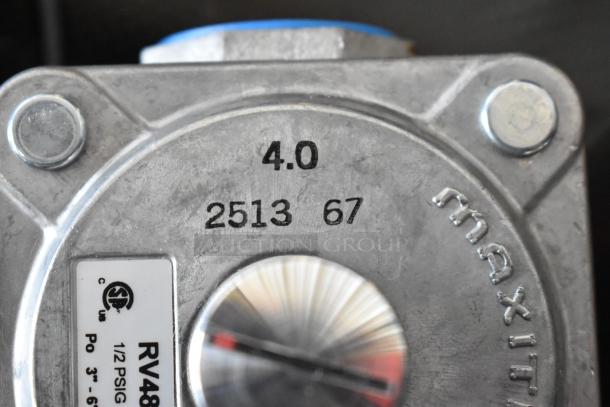 Gas regulator RV48, 1/2 PSIG, markings "4.0," "2513 67." Features adjustment dial, industrial use, UL certification visible.