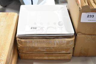 White square dinner plate set of three, stacked on cardboard boxes. Auction tag reads "232 QTY x3".
