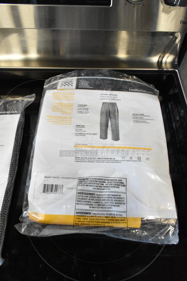 Chef Revival baggy pants in houndstooth pattern, new in packaging. Features include elastic waist, multiple pockets, and stitch detailing.