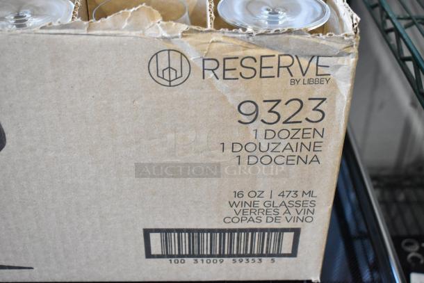 Box of 12 Libbey Reserve wine glasses, 16 oz capacity. Box label shows item number 9323 with visible barcode.
