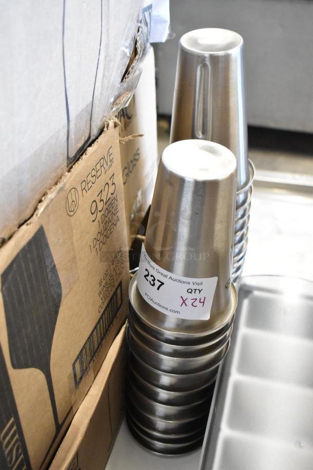 Stack of stainless steel drink shakers, labeled "Lot 237, Qty 24," next to a "Reserve" shipping box.