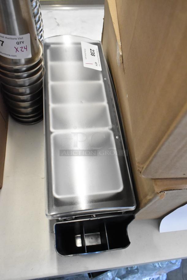 Stainless steel ice bin, partitioned design, in excellent condition, auction tag labeled "238 QTY".