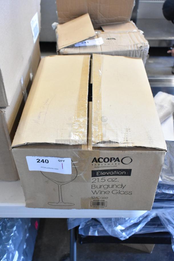 Box of Acopa 21.5 oz. Burgundy wine glasses, 12 per case, brand new, showing auction label with quantity 1.